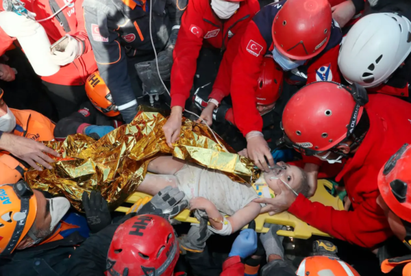 A child receiving medical care by volunteers. Photo: MalaysiaNow.